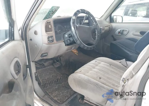 1996 GMC Sierra C1500 z USA, uszkodzony, nr VIN 1GTEC14W1TZ533735